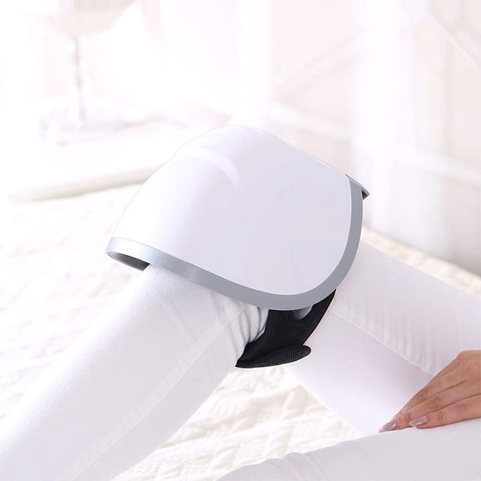 Manufacturers MINI knee massager middle-aged and elderly rheumatic joint knee physiotherapy instrument knee pad infrared hot compress old cold legs